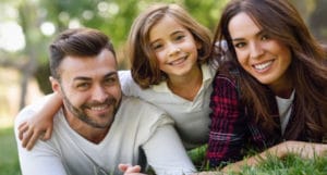 Family-on-Grass-Smiling